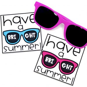 magenta sunglasses with tags that say have a bright summer