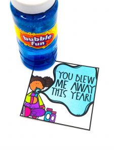 large bottle of bubbles with a tag that says you blew me away this year